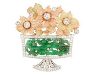 29
A Platinum, Bi-Color Gold, Jadeite Jade and Diamond Brooch
Of a vase design featuring a carved jadeite jade element, topped with yellow and rose gold flowers centering round diamonds and accented by princess-cut diamonds all weighing approximately 6.90 carats, signed Feriozzi 94, CM 6.16

Measures: 2 1/2 x 2 1/2 in.
58.6 grams gross

Accompanied by a Mason-Kay Report numbered #251006-5869, dated October 6,2025, stating the jade as natural jadeite with no dye or impregnation detected - 'A' jade.
Estimate: $4,000 - $5,000