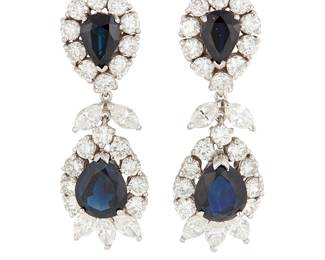 125
A Pair of Platinum, Sapphire and Diamond Earclips
Featuring four pear-shaped sapphires encircled by round and marquise-shaped diamonds weighing approximately 6.10 carats
2 pieces

Measures: 1 1/2 in.
17.9 grams gross
Estimate: $3,500 - $5,500