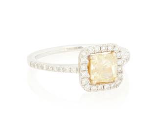 172
An 18K Bi-Color Gold, Colored Diamond and Diamond Ring
Centering a radiant-cut yellow diamond weighing approximately 0.50 carat, encircled by round diamonds

Size: 7 1/2
3.1 grams gross
Estimate: $2,500 - $3,500