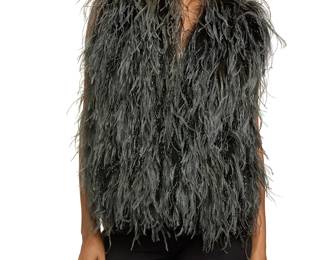 307
Maison Martin Margiela: A Grey Green Ostrich Feather Gilet Vest
Circa late 1990s-2000s, Italy
Labeled for Maison Margiela, 1 [circled] for Women's Collection, Made in Italy
A 'Women's Collection' cropped open-front vest adorned with grey ostrich feathers, dyed black turkey down, and black metallic long threads to the front panels, with green viscose rayon back and lining

Size 42 IT / US 6
Measurements: CB length: 20 in.; across back at lower shoulders: 14 in.; armhole circumference: 17 in.
Estimate: $300 - $500