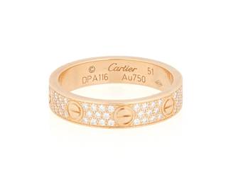 198
Cartier: An 18K Rose Gold and Diamond 'Love' Ring
Of an eternity design featuring a screw motif accented by round diamonds weighing approximately 0.31 carat, signed Cartier, 51, dpa116

Size: 5 3/4
3.8 grams gross
Estimate: $5,000 - $7,000
