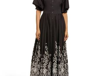 292
Michael Kors: A Black Poplin Embroidered Eyelet Maxi Shirtdress, 2019
Circa 2019, Italy
Label: Michael Kors Collection, Made in Italy
The crisp black poplin button-front dress with a fitted bodice with tiered puffed sleeves and a full maxi skirt with white floral eyelet embroidery to the hem and side pockets

Size 6
Measurements: CB length: to waist: 15 in; to hem: 59 in.; bust across front: 18 in.; waist across front: 14 1/2 in.; sleeves: 12 1/2 in.; sleeve band: 10 1/2 in. buttoned
Estimate: $100 - $200
