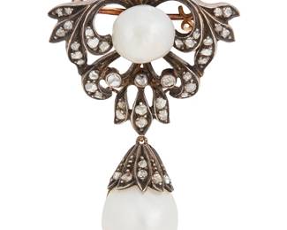 35
A Silver Topped-Gold, Natural Pearl and Diamond Brooch
Of an ornate design featuring two natural freshwater pearls accented by rose-cut diamonds

Measures: 1 3/4 x 1 1/8 in.
7.8 grams gross

Accompanied by a GIA Report numbered #6233646690, dated August 1, 2025, stating the Pearl as natural Freshwater Uniondae family, no treatment, White.
Estimate: $3,000 - $5,000