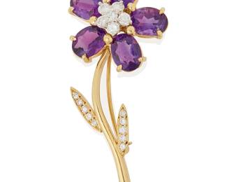 104
A 14K Gold, Amethyst and Diamond Brooch
Of a flower design featuring five oval amethysts as petals, finished with accents of round diamonds weighing approximately 0.52 carat

Measures: 2 x 7/8 in.
6.8 grams gross
Estimate: $1,000 - $1,500