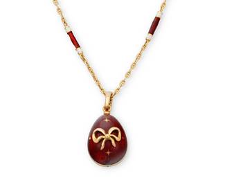 164
Fabergé : An 18K Gold and Enamel Egg Necklace
Featuring an red and white enamel link chain suspending a red enamel egg with bow detail, signed Faberge, no. 37/500 and 24/300 with original box and papers

Chain: 18 in., Pendant: 1 1/4 x 1/2 in.
18.7 grams gross
Estimate: $1,200 - $1,800