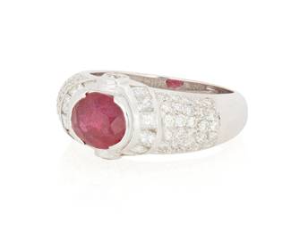 216
An 18K White Gold, Ruby and Diamond Ring
Centering an oval ruby weighing approximately 1.54 carat, accented by sixty-four round and square-cut diamonds weighing approximately 1.00 carat

Size: 6
7.0 grams gross
Estimate: $1,500 - $2,500