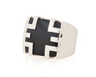 202
Cartier: An 18K White Gold and Falcons Eye 'Le Baiser du Dragon' Ring
Featuring a square-cut Falcon's eye tablet set in a geometric mount, signed Cartier, 60 997114, with signed box

Size: 9
33.3 grams gross
Estimate: $3,500 - $5,500