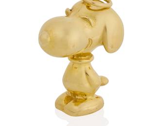 7
Cartier: An 18K Gold Snoopy Pendant
With a high polish finish, signed Cartier, United Feature, 1958, 1966, with signed pouch

Measures: 1 1/8 x 7/8 in.
19.2 grams gross
Estimate: $8,000 - $12,000