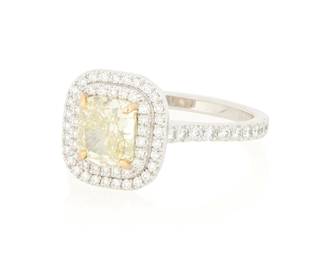 121
An 18K Bi-Color Gold, Fancy Yellow Diamond and Diamond Ring
Centering a round-cornered rectangular modified brilliant Fancy Yellow diamond weighing 1.63 carats, accented by two rows of round diamonds

Size: 7 1/4
4.8 grams gross

-Accompanied by a GIA Report numbered #1146780189, dated July 17, 2012, stating the diamond as Natural with a color grade of Fancy Yellow and a clarity grade of VS2, no fluorescence.
Estimate: $3,000 - $5,000