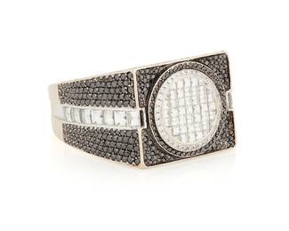 211
An 18K White Gold, Black Diamond and Diamond Ring
Featuring a geometric design set with round and French-cut black and near colorless diamonds weighing approximately 7.28 carats

Size: 14
41.2 grams gross
Estimate: $3,000 - $5,000
