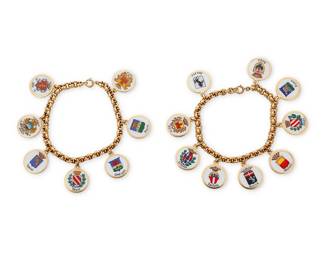 80
Two 18K Gold and Enamel Italian City Charm Bracelets
Composed of one bracelet suspending seven charms featuring Torino, Roma and Este, the other including nine charms featuring Sassari, Napoli and Acqui

Lengths: 8 in., Charms: 3/4 in.
128.1 grams
Estimate: $18,000 - $25,000
