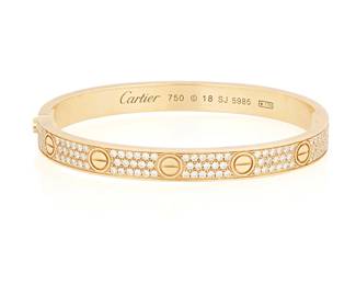 199
Cartier: An 18K Gold and Diamond 'Love' Bangle
Of a hinged design, featuring a screw design set with round diamonds weighing approximately 3.05 carats, signed Cartier 18, no. SJ5985, with Italian workshop mark

Inner circumference: 6 3/4 in.
41.2 grams gross
Estimate: $12,000 - $18,000