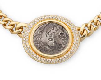 74
Bulgari: An 18k Gold and Ancient Coin 'Monete' Necklace
Centering an ancient Alessando Magno 336-323 a.c. coin, encircled by round diamonds weighing approximately 2.75 carats, signed Bulgari with Italian assay marks, with original pouch

Length: 15 1/2 in., Center Pendant: 1 5/8 x 1 1/2 in.
126.3 grams gross
Estimate: $35,000 - $55,000
