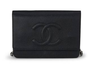 273
CHANEL: A CC Black Caviar Leather WOC Shoulder Bag, 2010-11
Circa 2010-2011, Italy
Marked to interior: Chanel / CC / Made in Italy; interior tag: No. 14994893
The "Wallet on a Chain" bag in black textured leather with silver-toned metal leather chain strap and branded snap closure, fully lined in black faille fabric and black leather, with multiple interior pockets, with dust bag

5 x 7 1/2 x 1 1/4 in. / 12.5 x 19 x 3 cm; strap drop: 24 1/2 in. / 62 cm
Estimate: $600 - $800