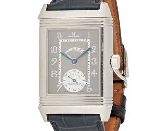 258
Jaeger-LeCoultre: A Platinum 'Reverso Tourbillon Number 2' Watch
Dial: 18.00 mm, a rectangular dial with Arabic hour markers and subsidiary dial, with a reverse skeleton movement side featuring twenty-five jewels
Model: Reverso Tourbillon 2
Case: 26.00 mm
Case number: 143/500, 110008 serial, 6565 reference
Closure: navy leather strap with a platinum deployment clasp
Signed: dial, case, clasp

Inner circumference: 6 1/2 - 8 in.
112.6 grams gross
Estimate: $20,000 - $30,000