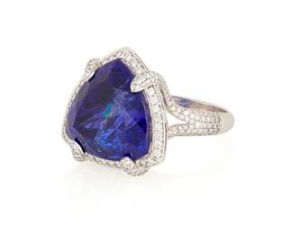133
An 18K White Gold, Tanzanite and Diamond Ring
Featuring a triangular-cut tanzanite weighing approximately 20.70 carats, accented by round diamonds

Size: 7 3/4
11.3 grams gross
Estimate: $3,000 - $5,000