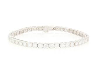 40
A 14K White Gold and Diamond Line Bracelet
Featuring forty-three round diamonds weighing approximately 9.20 carats

Length: 7 1/8 in.
14.3 grams gross
Estimate: $3,800 - $4,500