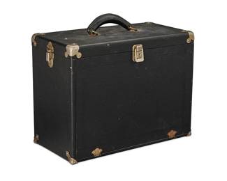 270
Marilyn Monroe's Black Leatherette Travelling Case
Circa 1950
The tall case with hinged lid and fall-front over a fitted interior covered in green felt, with two columns of multiple wooden drawers of varying sizes, with original auction tag and information card, and accompanied by a copy of the Christie's sale catalog: Christie's, "The Personal Property of Marilyn Monroe," New York, October 27 & 28, 1999
2 pieces

12 1/8 in. H x 16 1/4 in. W x 8 1/4 in. D
Estimate: $40,000 - $60,000