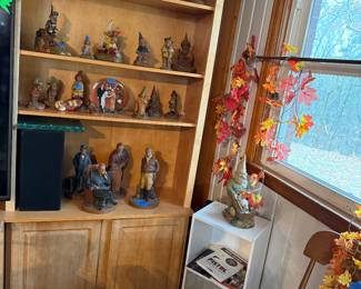 Lots of Tom Clark gnome figurines. 