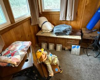 Hope chest. Fireman ventriloquist doll. Old school desk. Old ice block tongs. Old warming stone. 