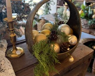 basket with greenery and Christmas balls
