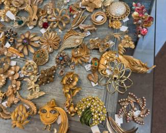 beautiful gold tone broaches