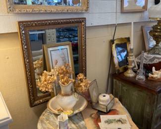mirrors, tables, framed art