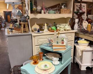 pretty aqua colored side table, plates, vintage furniture