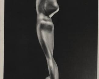 sculpture on blk background signed