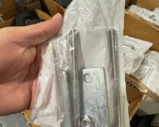 Several Strut to beam clamps with square U bolt kit