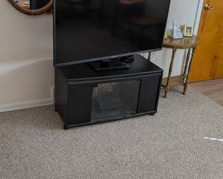 Decorative Mirror, 55" TV, and TV stand