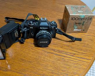 Nikon FG Film Camera, extra 100mm lense, flash & case with original instructions included