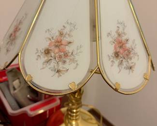 Glass floral etched touch lamp with a brass finish base 