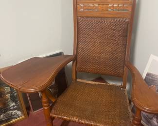 Very old wicker Chair.  Seat needs to be restrung.  Hand Carved.  In very good condition other than seat materials