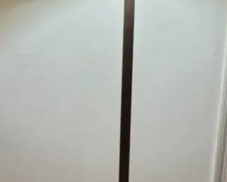 A Brass Floor Lamp With SilkOLite Lampshade