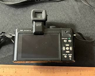 C67 - $60. Vintage Lumix Panasonic DMC-LX5 Digital Camera. W/ Live View Finder, Battery and Charger. Tested and Works.