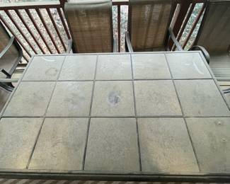 C93 - $150. Patio Table & Chairs. Needs a good bath but very sturdy! Table Measures 64.5" x 40" x 29.25" tall. Chairs are 22.5" wide x 39.5"tall. 