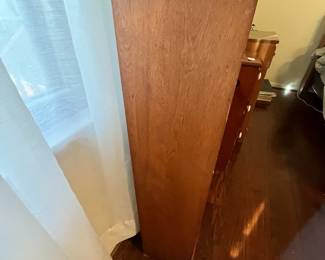 C33 - $30. Narrow - wooden bookcase. Measures 14" wide x 8" deep x 37" tall. 