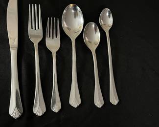 C13 - $75. Farberware 88 Pieces Stainless Flatware. 