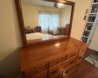 C29 - $60. Solid Wood Dresser with 6 drawers and mirror. (2 top - 2 middle - 2 bottom) All drawers slide. One drawer has a significant chip in the corner. Measures 48" x 30.25" tall x 17.5" deep. Mirror is NOT attached and can be hung either direction. 42" x 30". 