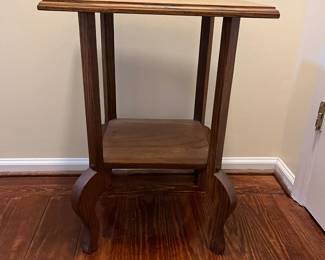 C19 - $50. Solid Oak Side Table. Measures 19" x 15" x 25.25" tall. 