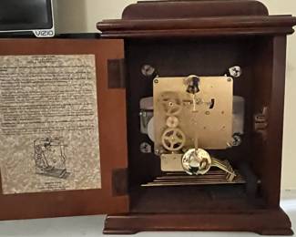 C26 - $50. Ridgeway Mantle Clock. Measures 10" wide x 6.5" deep x 14" tall. 