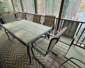 C93 - $150. Patio Table & Chairs. Needs a good bath but very sturdy! Table Measures 64.5" x 40" x 29.25" tall. Chairs are 22.5" wide x 39.5"tall. 