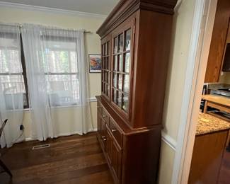 C15 - $95. Lighted China Display Cabinet. No name that we can find. Back paneling needs reattached and one latch needs a screw. Drawers all slide and doors open & close! Measures 57" wide x 82" tall x 17" deep bottom x 13" deep top. 