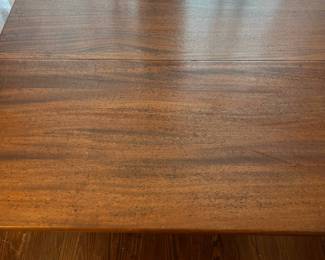 C48 - $75. Adorable Drop Leaf Table. The perfect size to use as an entry table or sofa table when not in use - or the right size for a 4 person dining table! Solid wood in very good condition with one exception - photographed. Measures 36" wide x 16" deep x 30" tall. Each Leaf adds 17.5". 