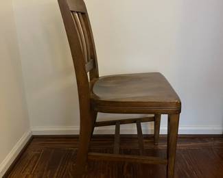 C47 - $40 PAIR of vintage solid wood dining chairs. Both are sturdy - one has a crack in the seat. Measures 18.25" wide x 34.5" tall. 