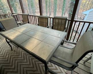 C93 - $150. Patio Table & Chairs. Needs a good bath but very sturdy! Table Measures 64.5" x 40" x 29.25" tall. Chairs are 22.5" wide x 39.5"tall. 