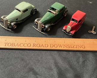C71 - $40. Triang Minic Tin Wind Up Cars. Lot of 3 Automobiles and 1 Key. 