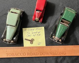 C71 - $40. Triang Minic Tin Wind Up Cars. Lot of 3 Automobiles and 1 Key. 
