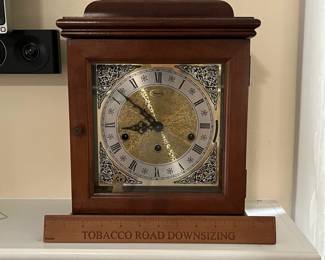 C26 - $50. Ridgeway Mantle Clock. Measures 10" wide x 6.5" deep x 14" tall. 